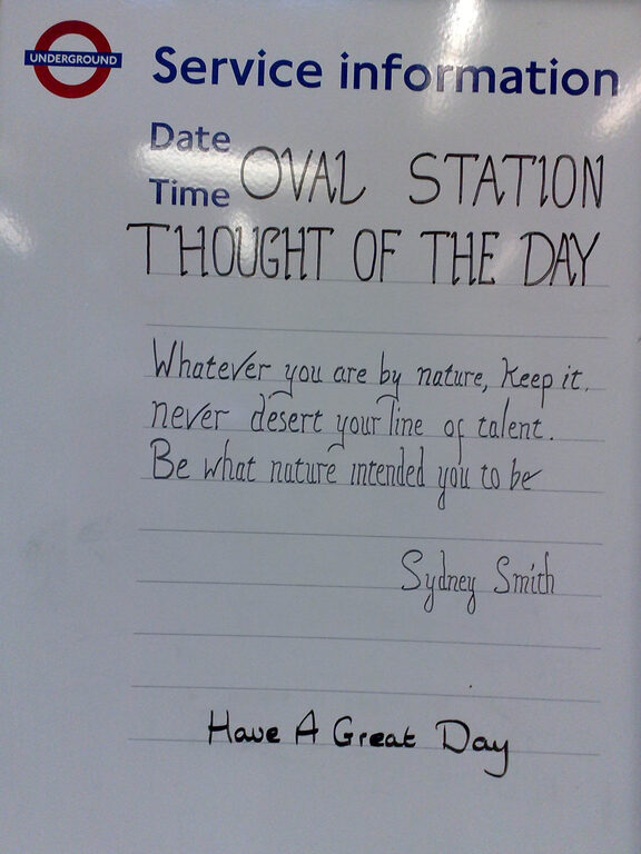 A Tube 'Service information' whiteboard at Oval station with a handwritten 'Thought of the Day' quote from Sydney Smith, signed off 'Have a great day'